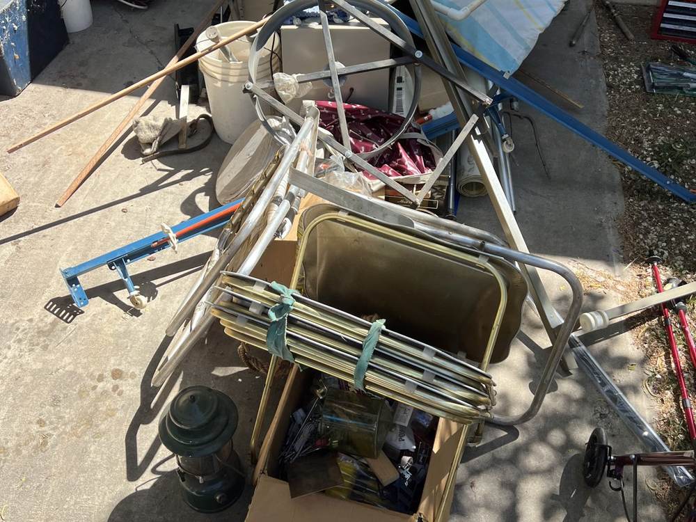 A real outdoor junk pile ready for the Easy Garage Cleaning crew to haul